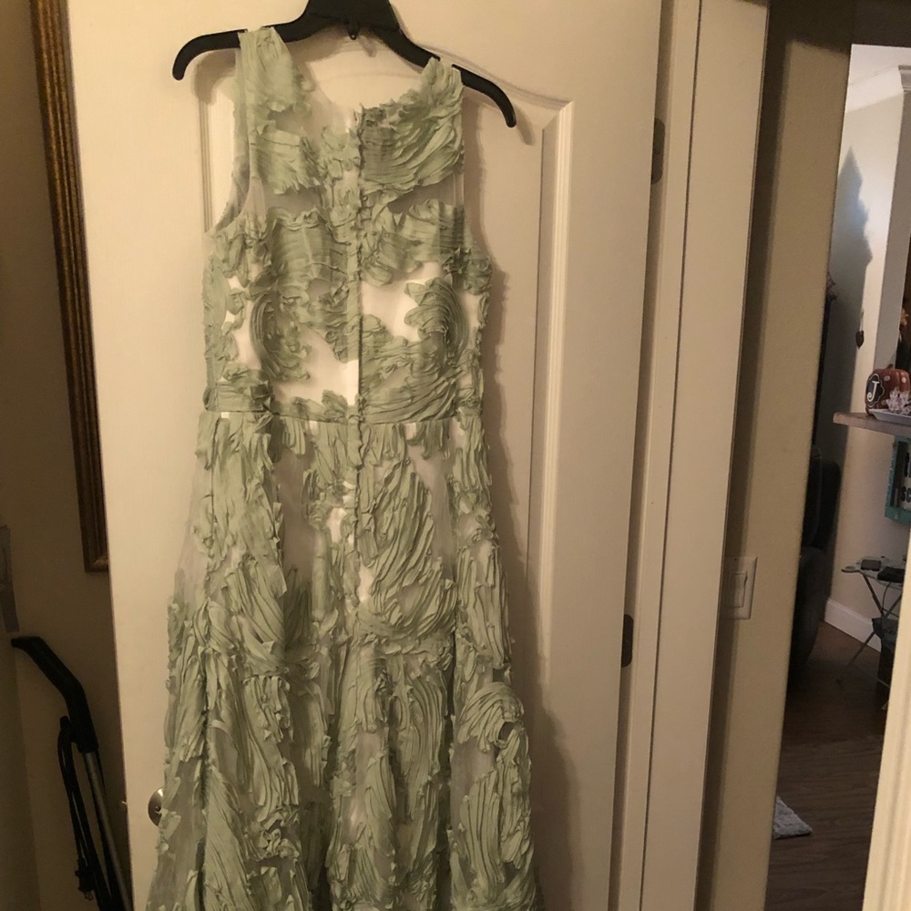 Mint green tulle fabric dress for a wedding or prom.